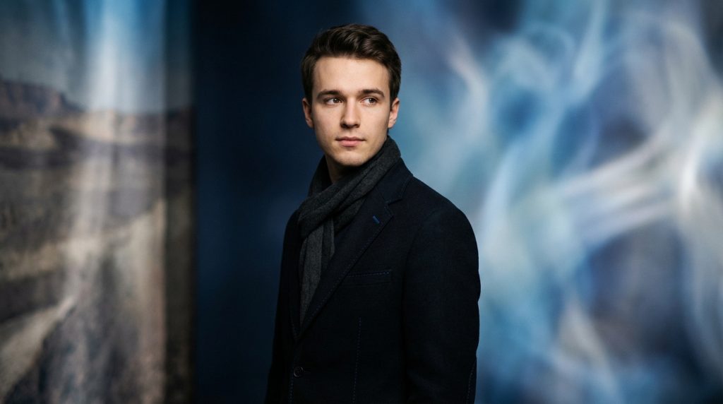 Timothée Chalamet in a dramatic pose from Dune, showcasing his role as Paul Atreides